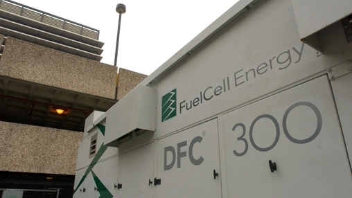 FuelCell Energy DFC 300 fuel cell system installed beside a commercial building